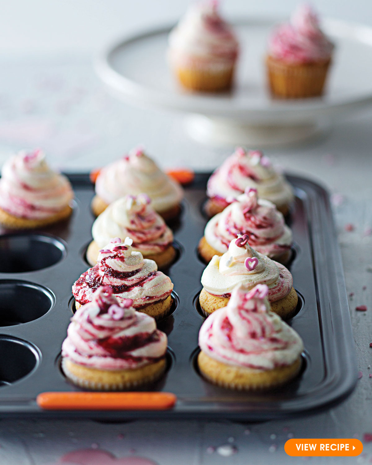 White Chocolate Cupcakes with Raspberry Icing